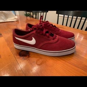 Size 11 men’s Red Nike Suede Sneakers